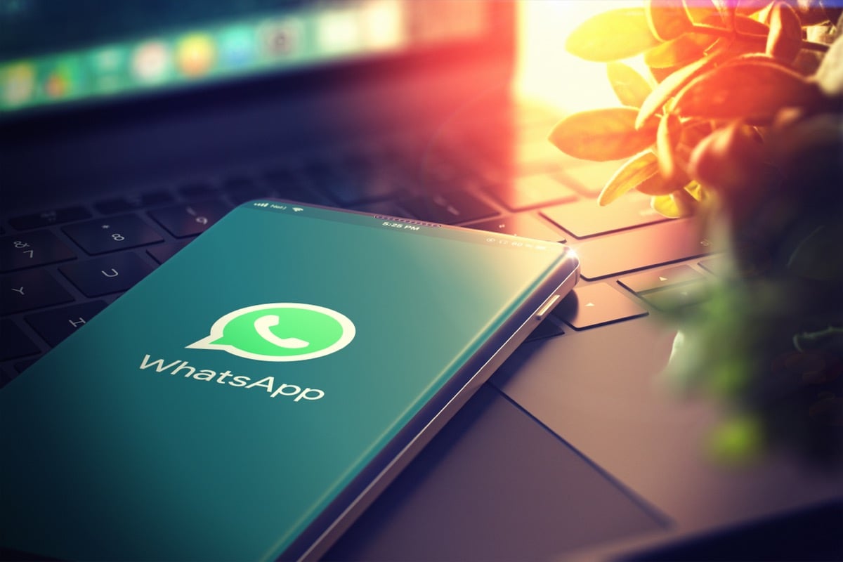 A smartphone displays the WhatsApp logo - KYIV, UKRAINE-JANUARY, 2020: Whatsapp on Smartphone Screen. 3D.